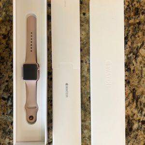 Apple Watch series 1 with an extra band.